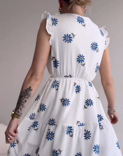 White sleeveless blue flower dress
